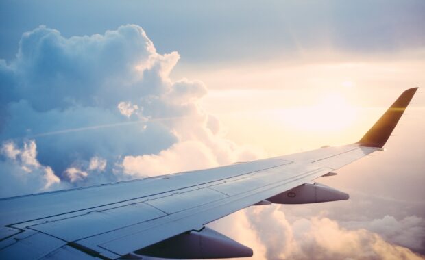 image of plane wing travelling abroad